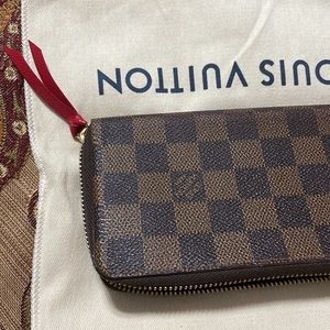 Louis Vuitton Damier wallet.